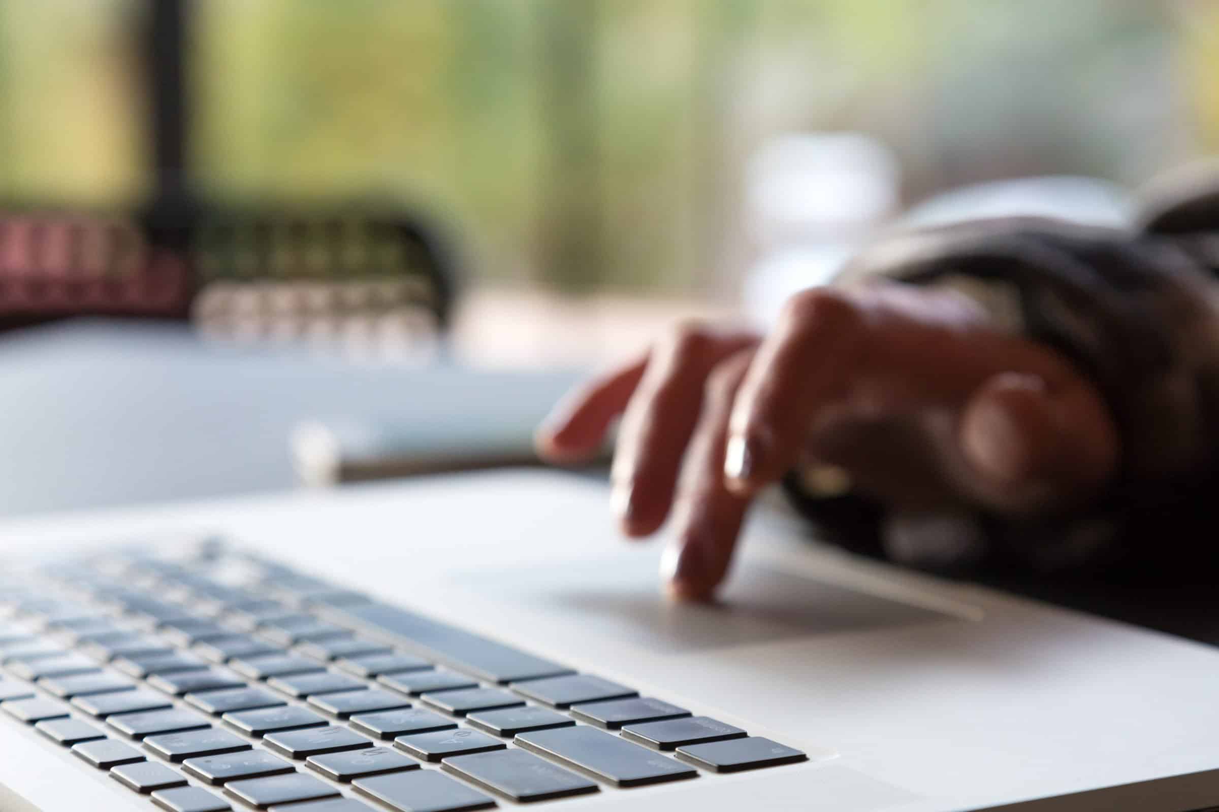 Close up Image of Computer and Hand