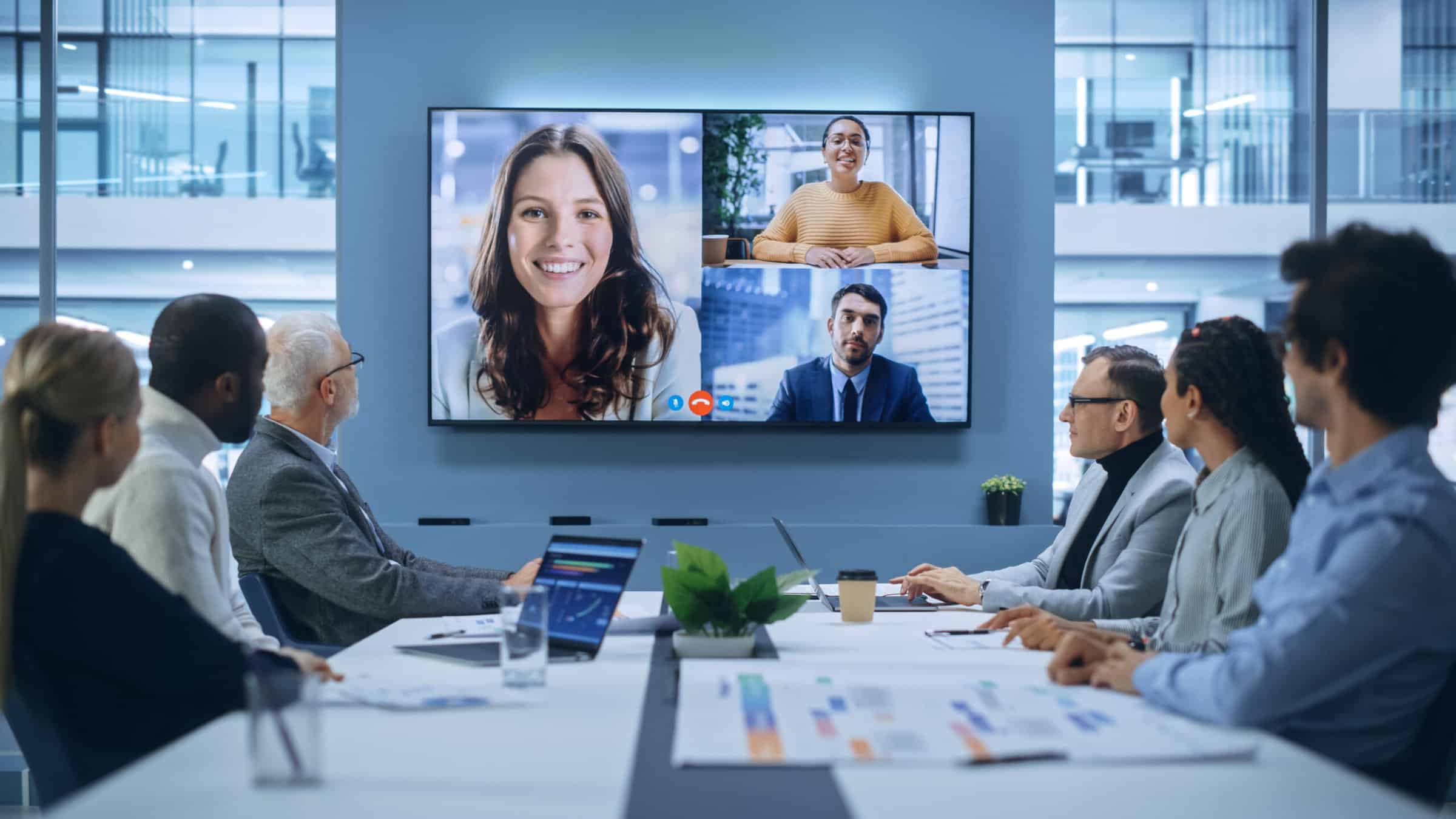 Video Conference Call in Office Boardroom Meeting Room